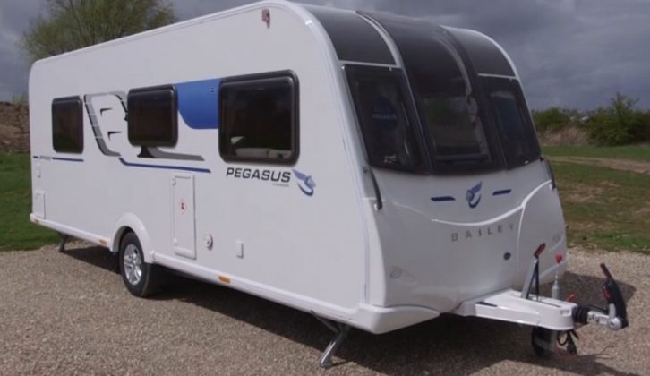 The 2016 Bailey Pegasus Brindisi boasts an end washroom and a transverse island bed