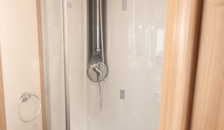 There's even a rail for hanging up wet towels in the large, stylish shower cubicle