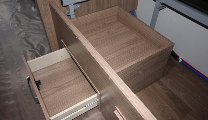 As well as the usual underbed storage, the offside fixed single has a pull-out drawer and a hidden shelf inside, the latter accessed only by lifting the bed base