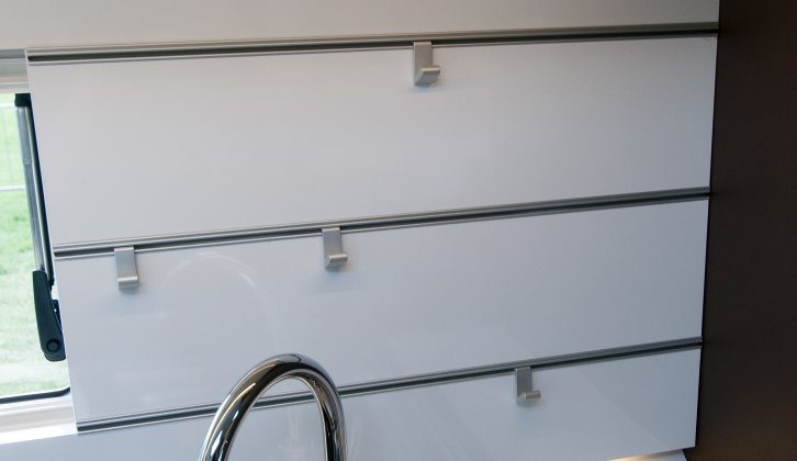 Place these hooks wherever you need in the stainless steel grooves, for flexible storage