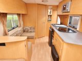 The Bailey Ranger's kitchen worktop is plentiful, extending over the heater, plus the sink and hob have covers