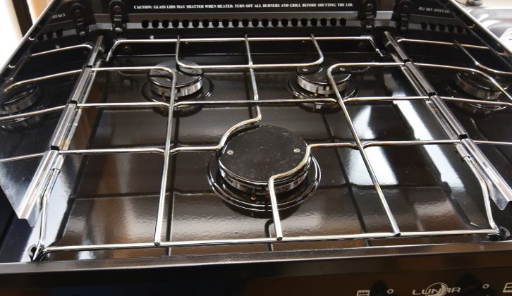 The Lunar's three-burner hob has a glass lid. The controls are at the front