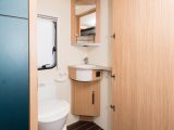 The washroom is shallow but has what you need: a shower 'cabin' is offered as an option by Knaus