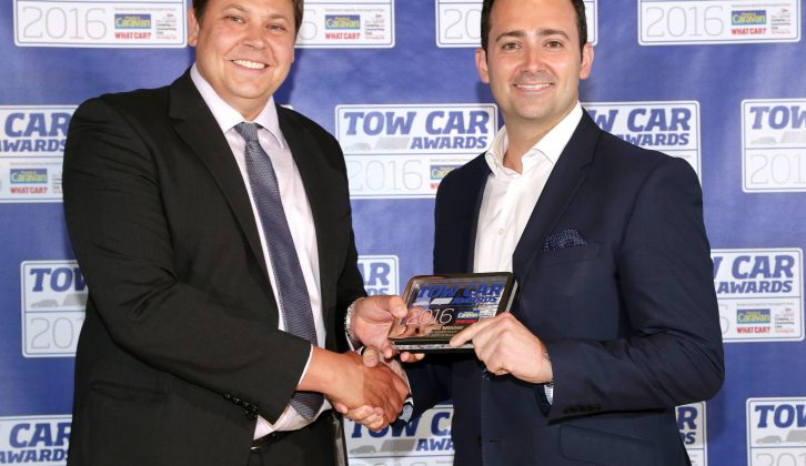 Pietro Panarisi from Škoda UK received the Superb Hatch's class and overall trophies from Practical Caravan's Group Editor Alastair Clements