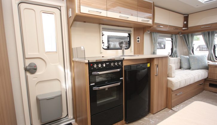 The kitchen has a separate oven and grill, a dual-fuel hob and a large Dometic fridge/freezer – read more in Practical Caravan's Lunar Clubman ES review