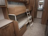 The side dinette converts into bunks measuring 1.83m x 0.63m (bottom) and 1.75m x 0.57m (top)