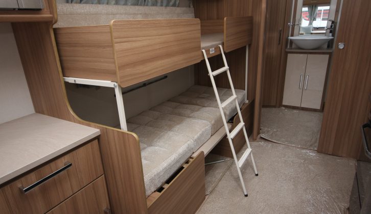 The side dinette converts into bunks measuring 1.83m x 0.63m (bottom) and 1.75m x 0.57m (top)