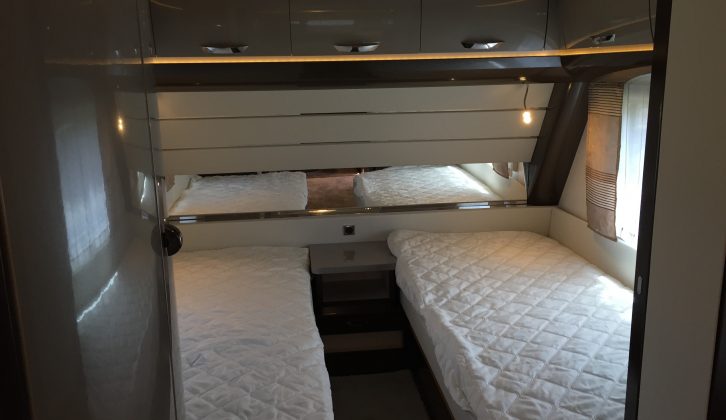 Thickly-padded twin single beds lie at the front of the Hobby Premium 560 UL which has an MTPLM of 1800kg