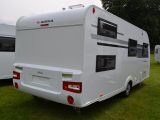 The windows for the fixed bunks give away this Adria caravan's layout from the outside