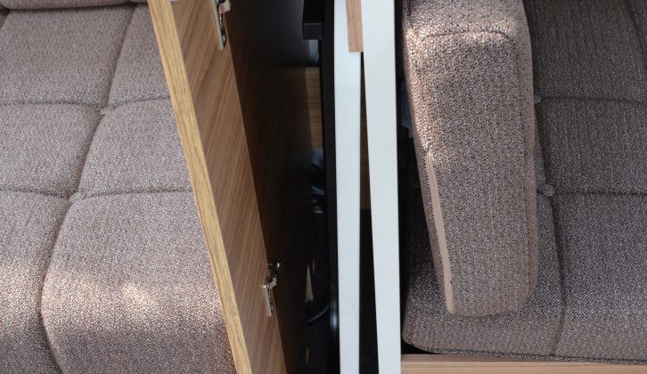 The freestanding table in this Adria caravan is stowed usefully near to where it will be used
