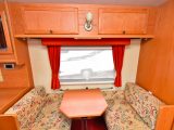 The offside dinette in the Applause is easily converted into a single bed – also, the Omni-Step was fitted as standard so ensure the mover works