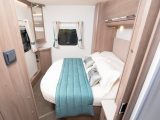 The elegant rear bedroom's transverse island bed retracts a full 400mm