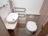 The toilet and sink are on the offside of this split central washroom – there's also a towel rail warmed by the Alde wet central heating