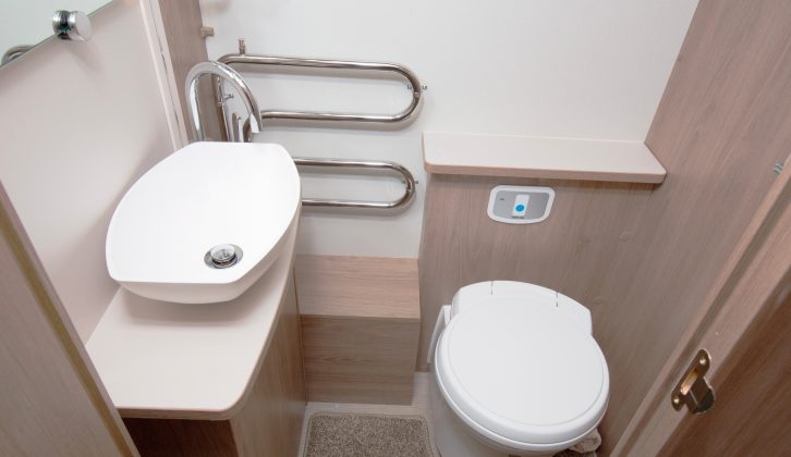 The toilet and sink are on the offside of this split central washroom – there's also a towel rail warmed by the Alde wet central heating