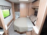 Retract the island bed in the day to permit easy access to the Coachman Laser 675's full-width end washroom