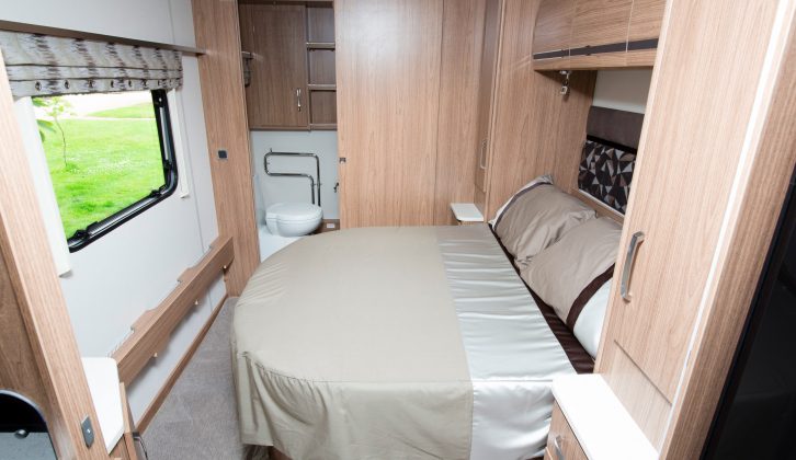 Retract the island bed in the day to permit easy access to the Coachman Laser 675's full-width end washroom