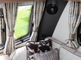 The two-tone grey ‘Logrono’ upholstery is very smart and the speakers are well-positioned – read more in the Practical Caravan Coachman Laser 675 review