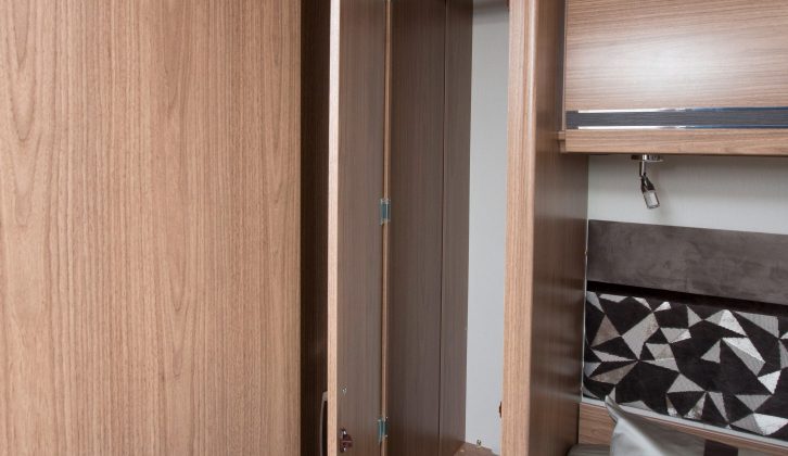 Wardrobes flank the island bed, and there's sufficient room to rest a cuppa and a book