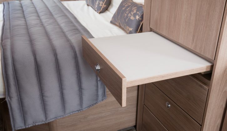 A shelf pulls out from under the wardrobe, perfect for perching a cuppa or glasses