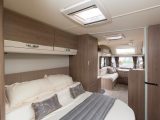 You get two broad overhead lockers and the lightweight mattress folds to form a headrest for daytime use – there’s a slimmer headrest behind
for when the bed is extended