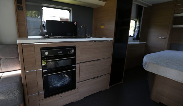 Worktop space is minimal, but the kitchen's spec is generous, including a large slimline fridge/freezer