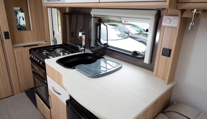 Thoughtful positioning of the hob and sink provides an excellent amount of work space in the nearside kitchen