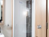 The revised washroom has a large and rather stylish, fully-lined shower cubicle