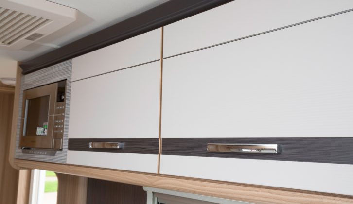 However, the kitchen area has its own identity thanks to the cream-coloured lockers