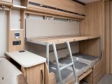 The dinette converts into bunks, the lower measuring 1.83m x 0.72m, the upper 1.76m x 0.61m