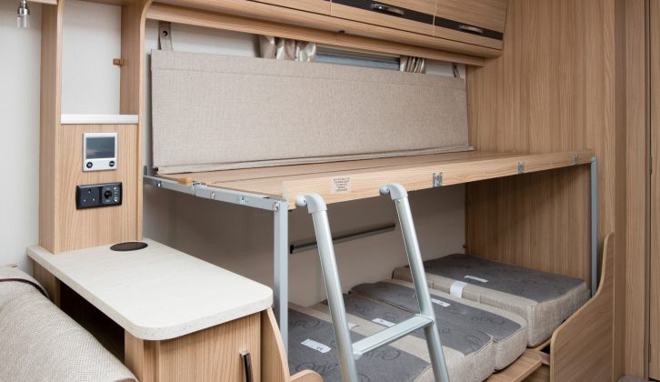 The dinette converts into bunks, the lower measuring 1.83m x 0.72m, the upper 1.76m x 0.61m