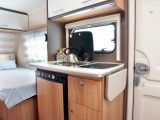 A worktop extension flap gives more food prep space in the 450's kitchen