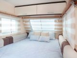 Enjoy domestic-style comfort in the Caravelair Antarès 455's bedroom