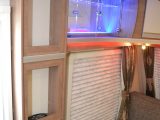 The Alarias even have this snazzy backlit cocktail cabinet and bar – see them at the Motorhome and Caravan Show