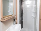 There's now a spacious shower cubicle with a one-piece door in the nearside rear corner