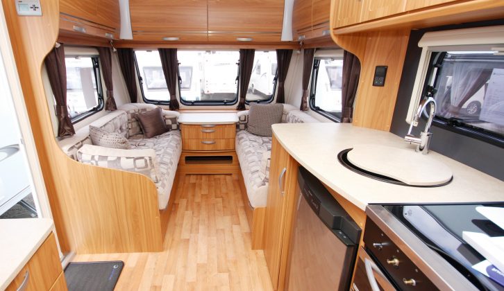 The centre chest, with its occasional table, offers a practical dining option for couples in the Lunar caravan