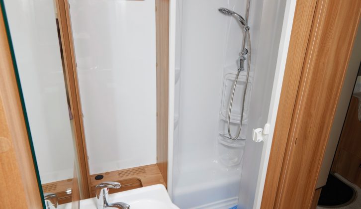 The fully lined shower cubicle sits on the nearside and has lots of space for toiletries