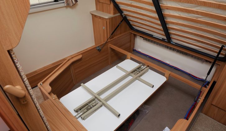As promised, the table is stowed under the fixed bed – this space has no external access