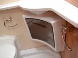 The moulded cupboard below the basin is rather flimsy in the Caravelair Antarès 335