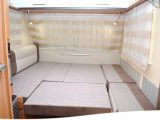 Need more space? The addition of a couple of boards and the remaining seats creates a larger double bed