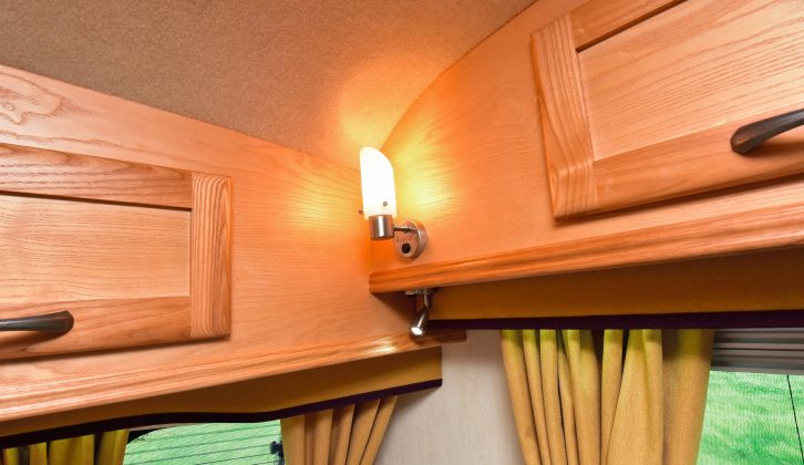 Mains lighting is fitted, along with 12V LED spots and ceiling lights – read more in the Practical Caravan Vanmaster V640s review