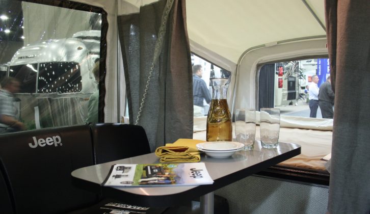 The interior of the Jeep trailer-tent is minimal, but has storage and powerpoints, plus a small dinette