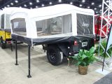 The lid of the Jeep trailer tent folds open and sits on sturdy supports to create a decent double bed. Rear lights match those of the Jeep tow car