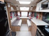 The shaped bolsters at the front of the lounge will help you relax and get comfortable in this Swift caravan