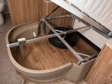 Lift the fixed bed to reveal a useful storage space – read more in the Practical Caravan Swift Challenger 645 review