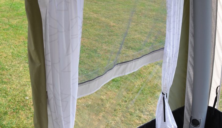 The awning's curtains come with solid rods and proper ties to keep them tidy