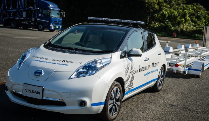 The autonomous tow cars operating at this Nissan factory could hint at the future for caravanners