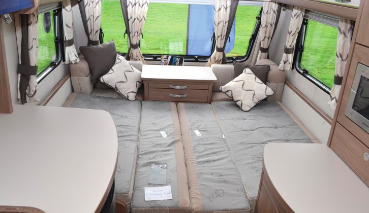 You'll have no problem making up the front double bed in this Compass caravan, which measures 1.99m x 1.50m