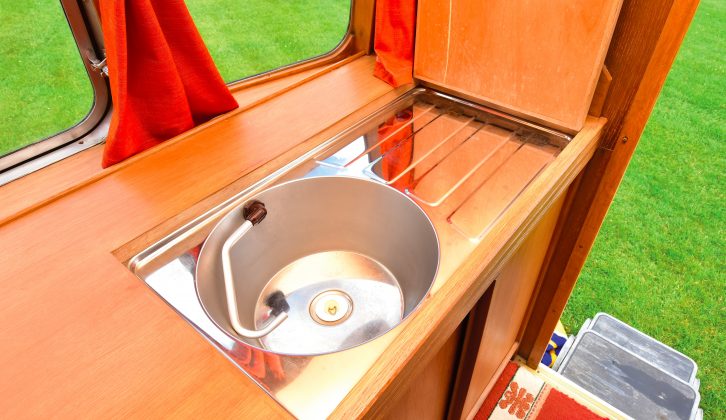 The sink/drainer in this vintage caravan would originally have been plastic