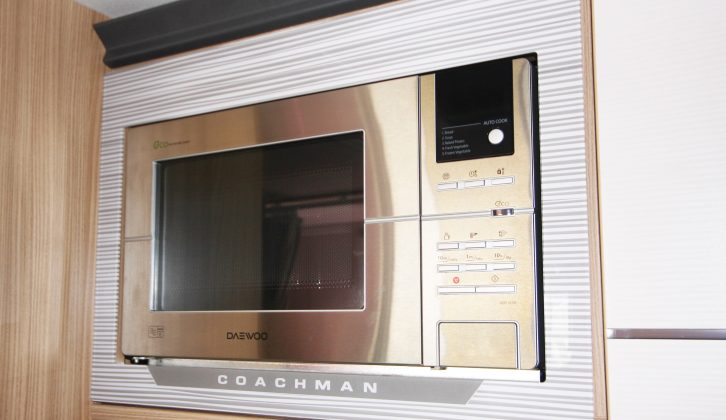 We think the microwave looks very smart, but it's sited high up and over the hob, which is not ideal