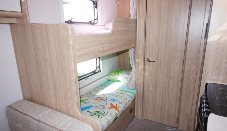 Each fixed bunk bed (1.87m x 0.62m) gets a window, a reading light and a curtain – we think kids will love them!